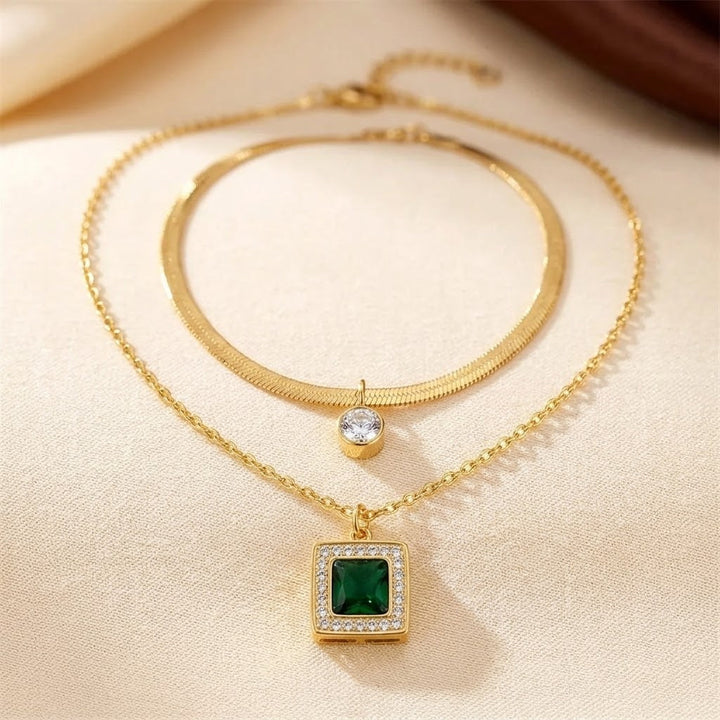 Collier superposé en or et émeraude — Groumia