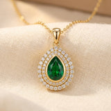 Collier en goutte d'eau en or et émeraude — Groumia