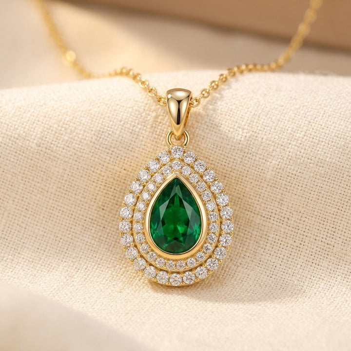 Collier en goutte d'eau en or et émeraude — Groumia