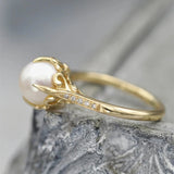 Bague vintage avec perle dorée au centre — Groumia