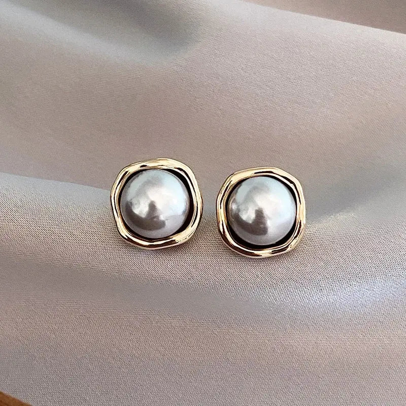 Boucles d'oreilles élégantes en perle noire — Groumia