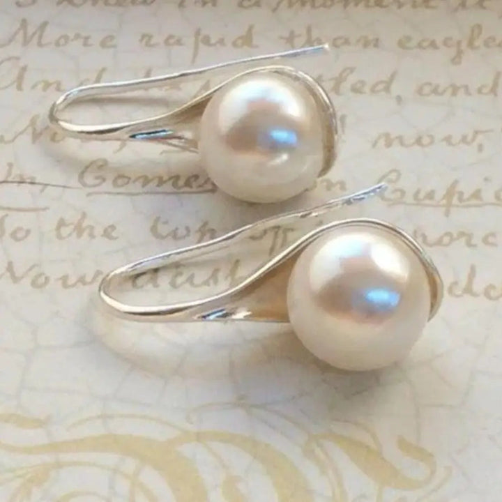 Boucles d'oreilles en forme de goutte avec des marguerites — Groumia
