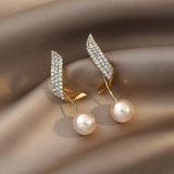 Boucles d'oreilles en or avec perles — Groumia
