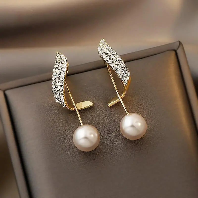 Boucles d'oreilles en or avec perles — Groumia