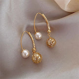 Boucles d'oreilles rétro en or avec des marguerites — Groumia