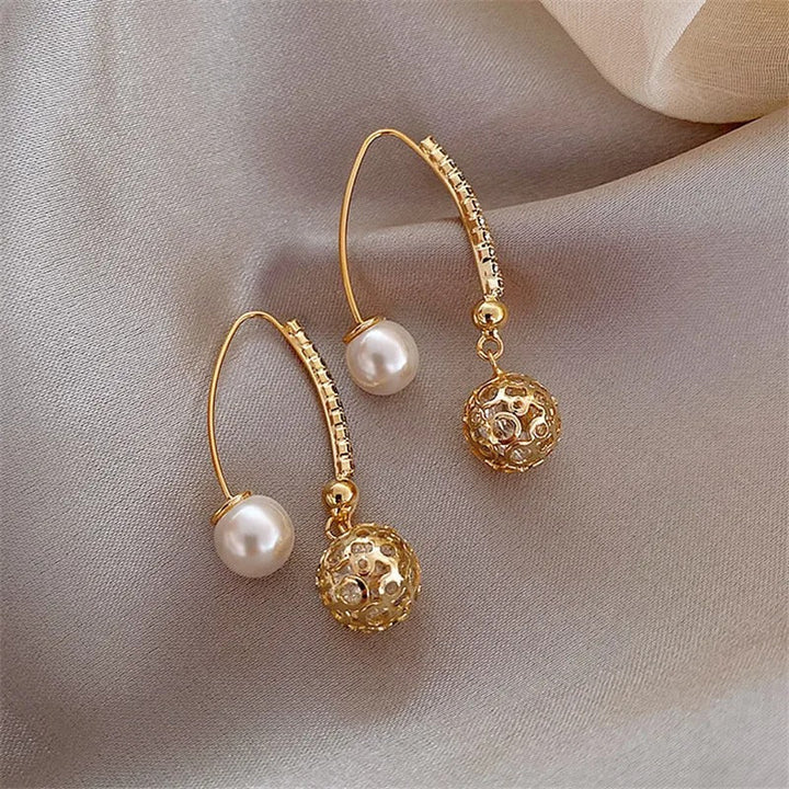 Boucles d'oreilles rétro en or avec des marguerites — Groumia