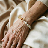 Bracelet élégant en or et marguerites — Groumia