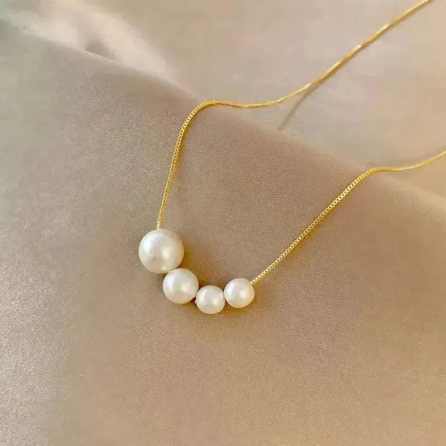 Collier en or avec de jolies perles — Groumia