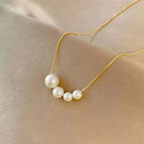 Collier en or avec de jolies perles — Groumia