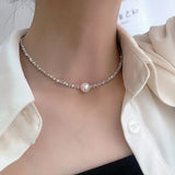 Collier rétro avec perles — Groumia