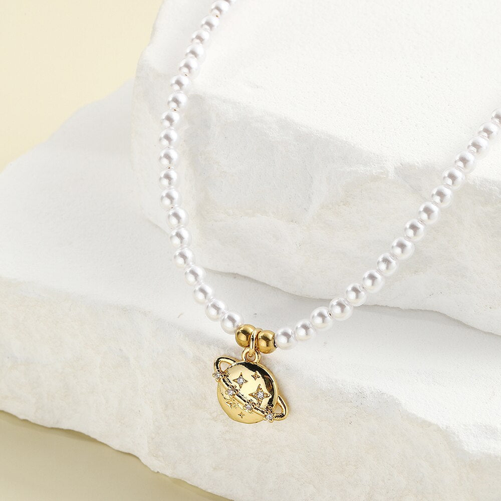 Collier perle planete — Groumia