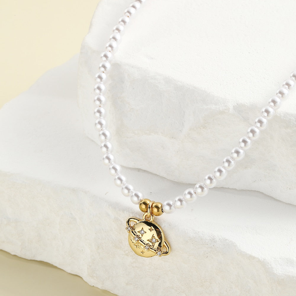 Collier perle planete — Groumia