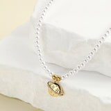 Collier perle planete — Groumia