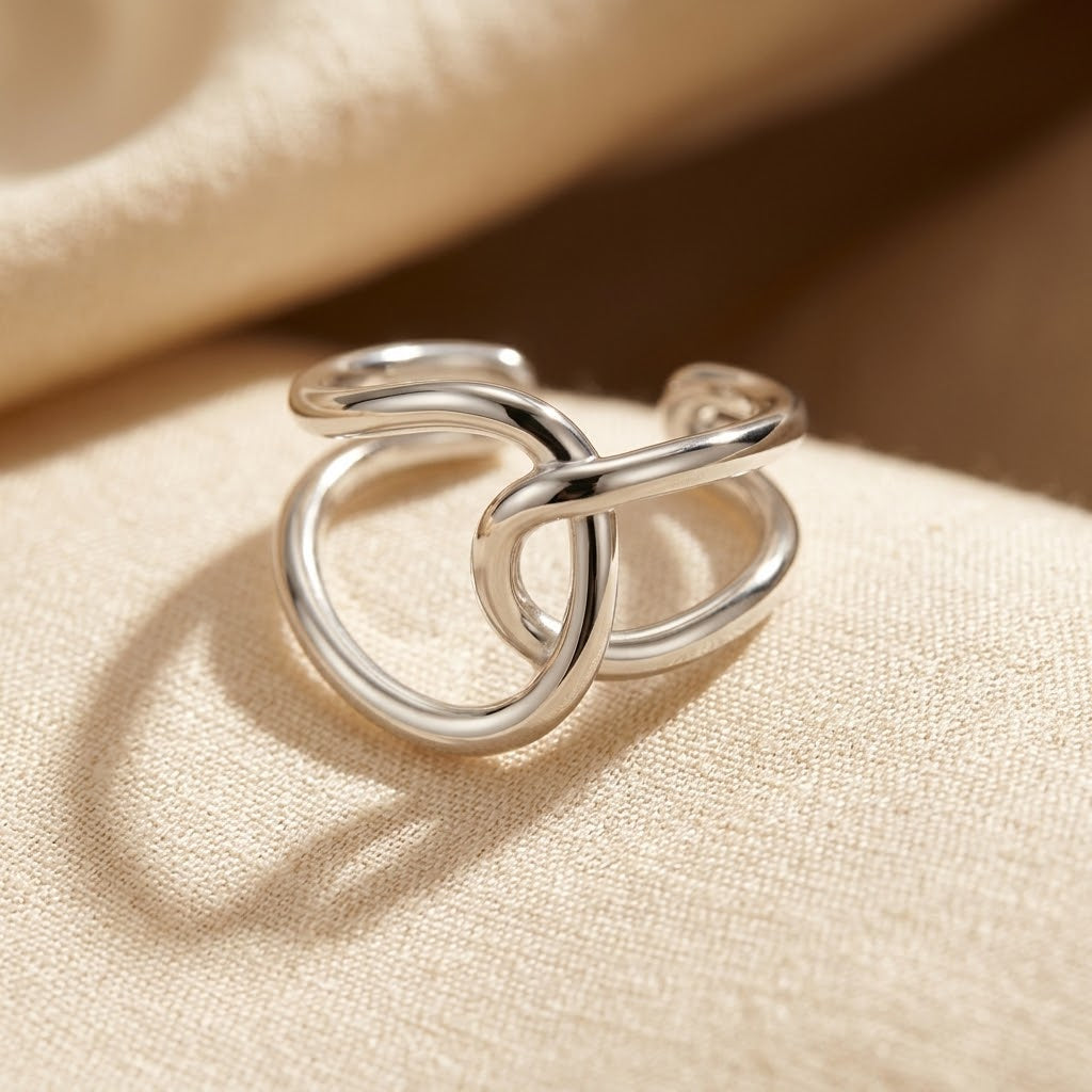 Bague ouverte en argent entrelacée — Groumia